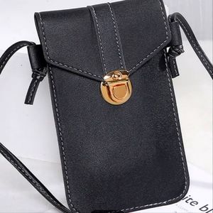 black Id cards and phone bag